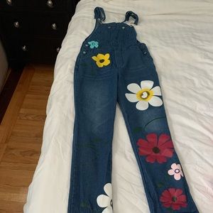 Jean overalls with flowers never worn size small lightweight denim. Runs small